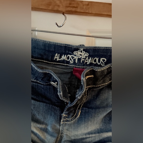 Almost Famous Distressed Blue Denim Shorts with Striped Pocket Trim - Picture 2 of 5